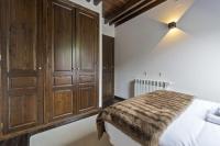 Postel nebo postele na pokoji v ubytování Luderna - Casa con terraza Unhola