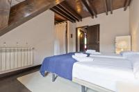 Postel nebo postele na pokoji v ubytování Luderna - Casa con terraza Unhola