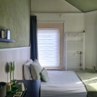 Een bed of bedden in een kamer bij Hotel 't Witte Huys Scheveningen