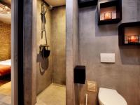 a bathroom with a toilet and a shower at Fancy Holiday Home in Sainte C cile with Pool House Indoor Pool in Sainte-Cécile