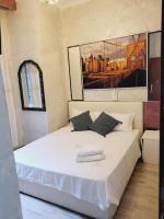 Posteľ alebo postele v izbe v ubytovaní Captin Home Roma