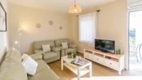 A television and/or entertainment centre at Campo del Abuelo Nerja by Ruralidays