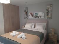 A bed or beds in a room at Villa Pappas