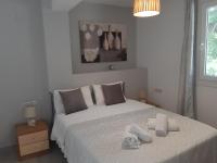 A bed or beds in a room at Villa Pappas