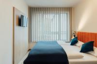 MYKY Hotel Boardinghouseにあるベッド