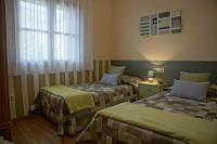 Posteľ alebo postele v izbe v ubytovaní Apartaments El Ribal