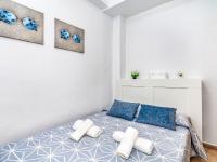 Postel nebo postele na pokoji v ubytování Apartment Benasol-1 by Interhome