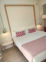Łóżko lub łóżka w pokoju w obiekcie Sol i Vida Hotel - Adults Only