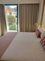 Łóżko lub łóżka w pokoju w obiekcie Sol i Vida Hotel - Adults Only