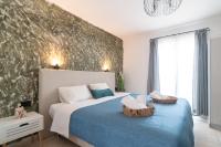 Posteľ alebo postele v izbe v ubytovaní Amarylis Beachfront Studios