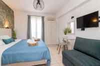 Posteľ alebo postele v izbe v ubytovaní Amarylis Beachfront Studios