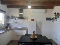Kuchyň nebo kuchyňský kout v ubytování Apartamento en Mala con vista al mar