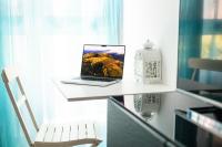 A television and/or entertainment centre at Las Palmas Lighthouse Apartment