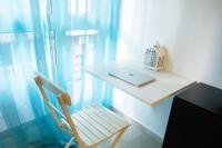 A television and/or entertainment centre at Las Palmas Lighthouse Apartment