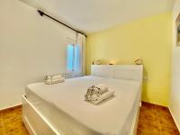 Posteľ alebo postele v izbe v ubytovaní Bale Apartment near the beach by HLCLUB Agency