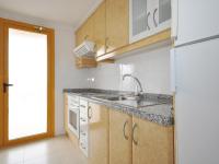 A kitchen or kitchenette at Apartamentos Ambar Beach Unitursa