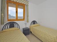 A bed or beds in a room at Apartamentos Ambar Beach Unitursa