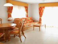 A seating area at Apartamentos Ambar Beach Unitursa