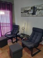 Posedenie v ubytovaní Apartamento Sirena