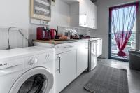 Kuchyň nebo kuchyňský kout v ubytování Ceramus Apartments Gazi View
