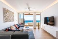 A television and/or entertainment centre at BEACHFRONT -- NEW LUXURY Apartment -- 1ª Linea Playa -- Fuengirola CITY CENTER -- Private PARKING -- Panoramic Sea Views --