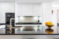 A kitchen or kitchenette at BEACHFRONT -- NEW LUXURY Apartment -- 1ª Linea Playa -- Fuengirola CITY CENTER -- Private PARKING -- Panoramic Sea Views --
