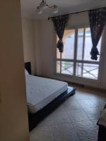 Postel nebo postele na pokoji v ubytování La Vista 1, Ain Soukhna Family Chalets