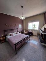 Postel nebo postele na pokoji v ubytování Platanidia Apartment Pelion