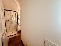 a bathroom with a shower and a mirror at Pomme d&#39;api - 319 in Rouen