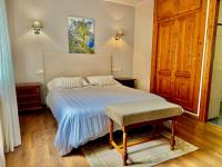 Postel nebo postele na pokoji v ubytování Hotel La Rivera