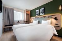 Campanile Prime Paris 19 - La Villetteにあるベッド