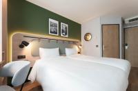 Campanile Prime Paris 19 - La Villetteにあるベッド