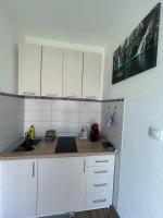 Kuchyňa alebo kuchynka v ubytovaní Studio apartman Marta