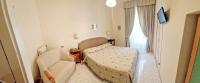 Hotel Toroにあるベッド