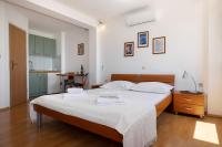 Posteľ alebo postele v izbe v ubytovaní Jasminka apartments