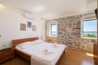 Posteľ alebo postele v izbe v ubytovaní Jasminka apartments