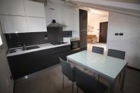 A kitchen or kitchenette at Appartamenti Colombo