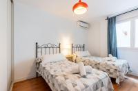 Postel nebo postele na pokoji v ubytování SN Parking Incluido 4Bd 2Bth Excelente Ubicacion