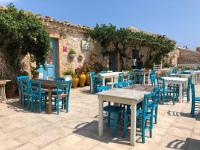 A restaurant or other place to eat at "The Cottage"with sea view, parking & wifi