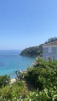 a house with a view of the ocean at Maison en bord de mer en Corse Lavasina Brando in Brando