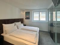 Posteľ alebo postele v izbe v ubytovaní Ischglliving Family Appartements