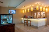Kuchyň nebo kuchyňský kout v ubytování Side Breeze Hotel