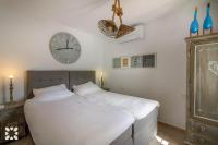 Postel nebo postele na pokoji v ubytování Villa Condor by Abahana Villas