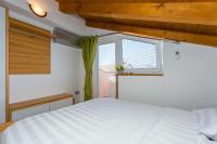 Posteľ alebo postele v izbe v ubytovaní Stone House Ana Funtana