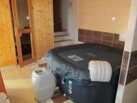 A bed or beds in a room at A+S Penzion Podzamok