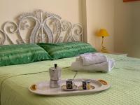 Posteľ alebo postele v izbe v ubytovaní Holiday House Naxos