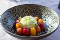 a bowl of fruit with ice cream in it at Warsaw Presidential Hotel in Warsaw