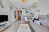 TV a/nebo společenská místnost v ubytování Vistamarina 403A By IVI Real Estate
