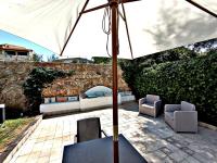 Posedenie v ubytovaní Villa Deluxe con Idromassaggio