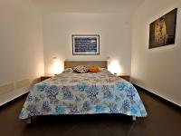 Posteľ alebo postele v izbe v ubytovaní Villa Deluxe con Idromassaggio